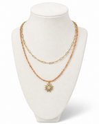 Amelia Jane Handmade Creations Golden Hour layered necklace with sunstone beads, gold chain, and sunburst pendant.