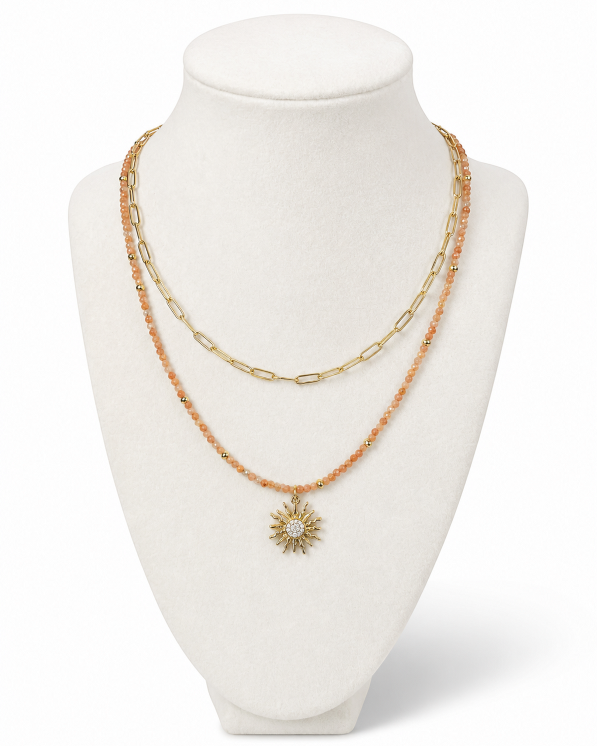 Amelia Jane Handmade Creations Golden Hour layered necklace with sunstone beads, gold chain, and sunburst pendant.