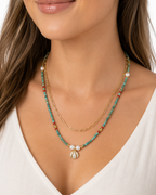 Amelia Jane Handmade Creations Tidal Shores layered necklace with turquoise, red coral, pearls, and gold shell pendant
