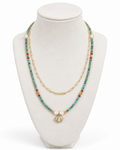 Amelia Jane Handmade Creations Tidal Shores layered necklace with turquoise, red coral, hematite, and pearl beads.