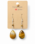 Amelia Jane Handmade Creations tiger eye teardrop earrings with S925 silver posts on a display card.