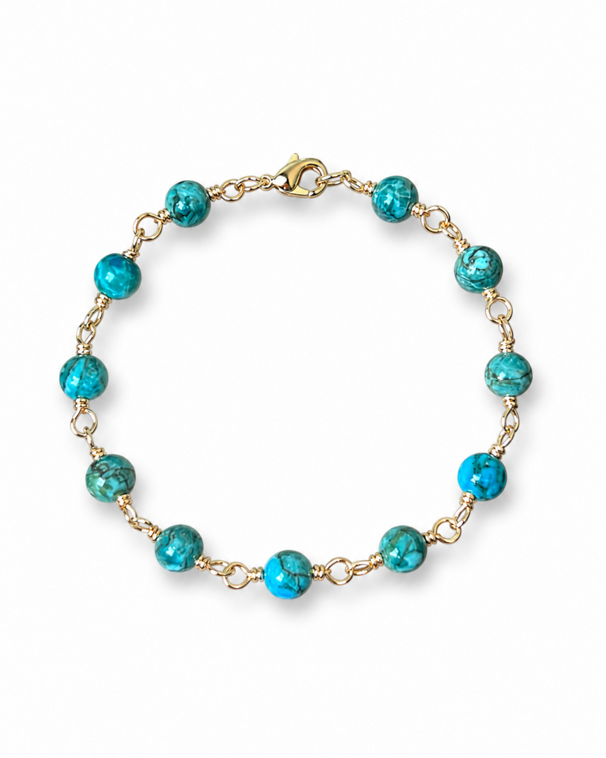Amelia Jane Handmade Creations 7-inch station bracelet featuring turquoise beads on a gold-tone chain