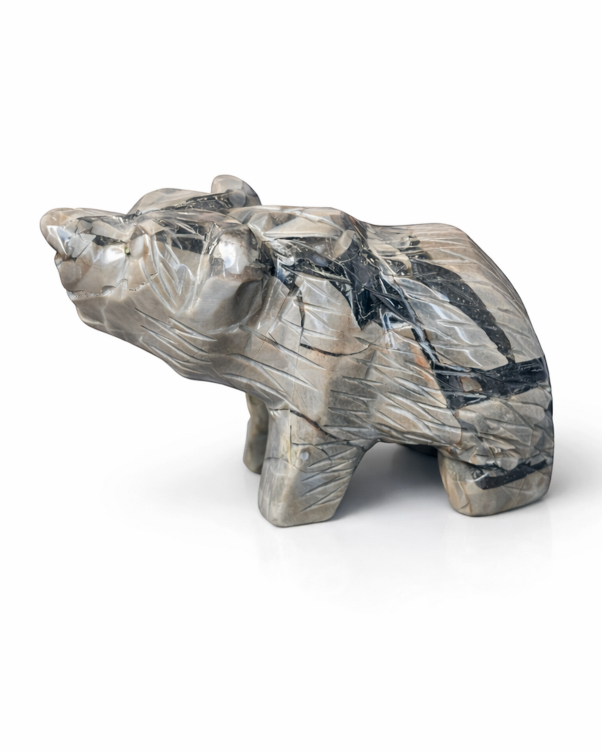 Amelia Jane Handmade Creations 4-inch volcano agate bear carving with natural smoky gray banding and detailed texture.