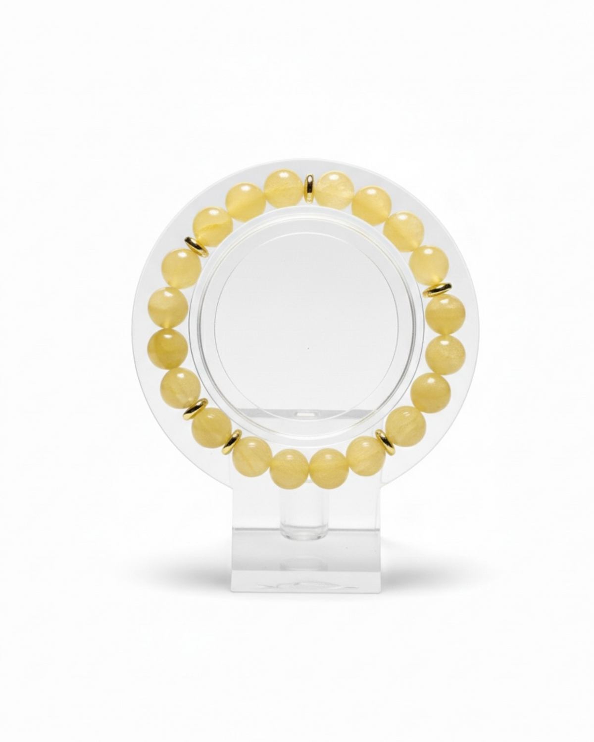 Amelia Jane Handmade Creations 7-inch beaded bracelet featuring yellow jade spheres and gold-tone hematite accents.