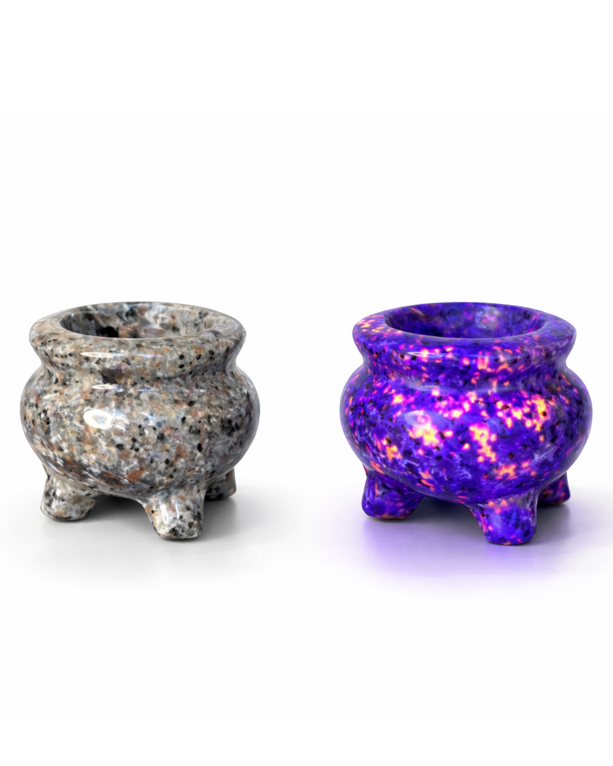 Amelia Jane Handmade Creations 1.75 inch Yooperlite cauldron shown in natural light and glowing under UV blacklight.